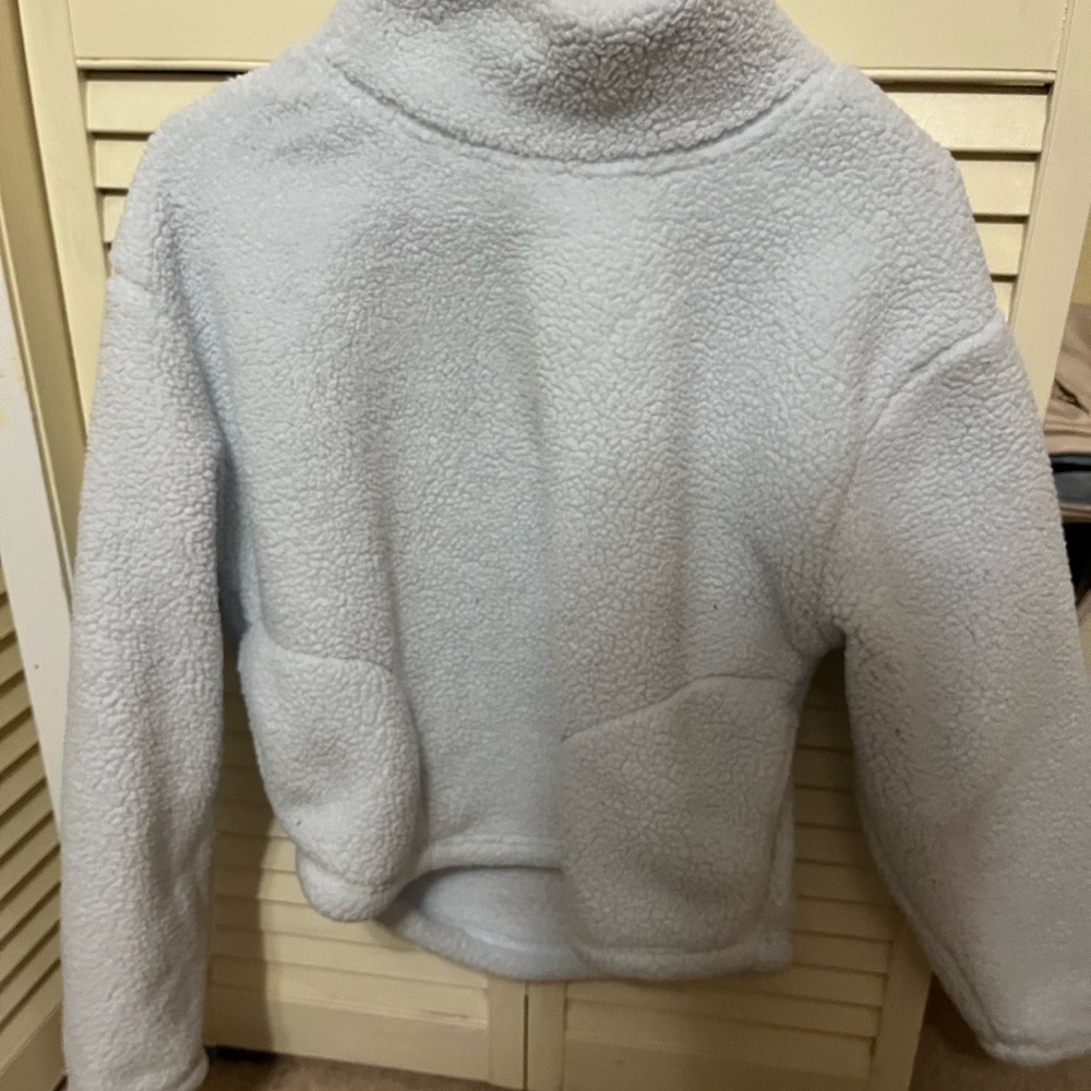 Plush cropped length turtleneck sweatshirt
